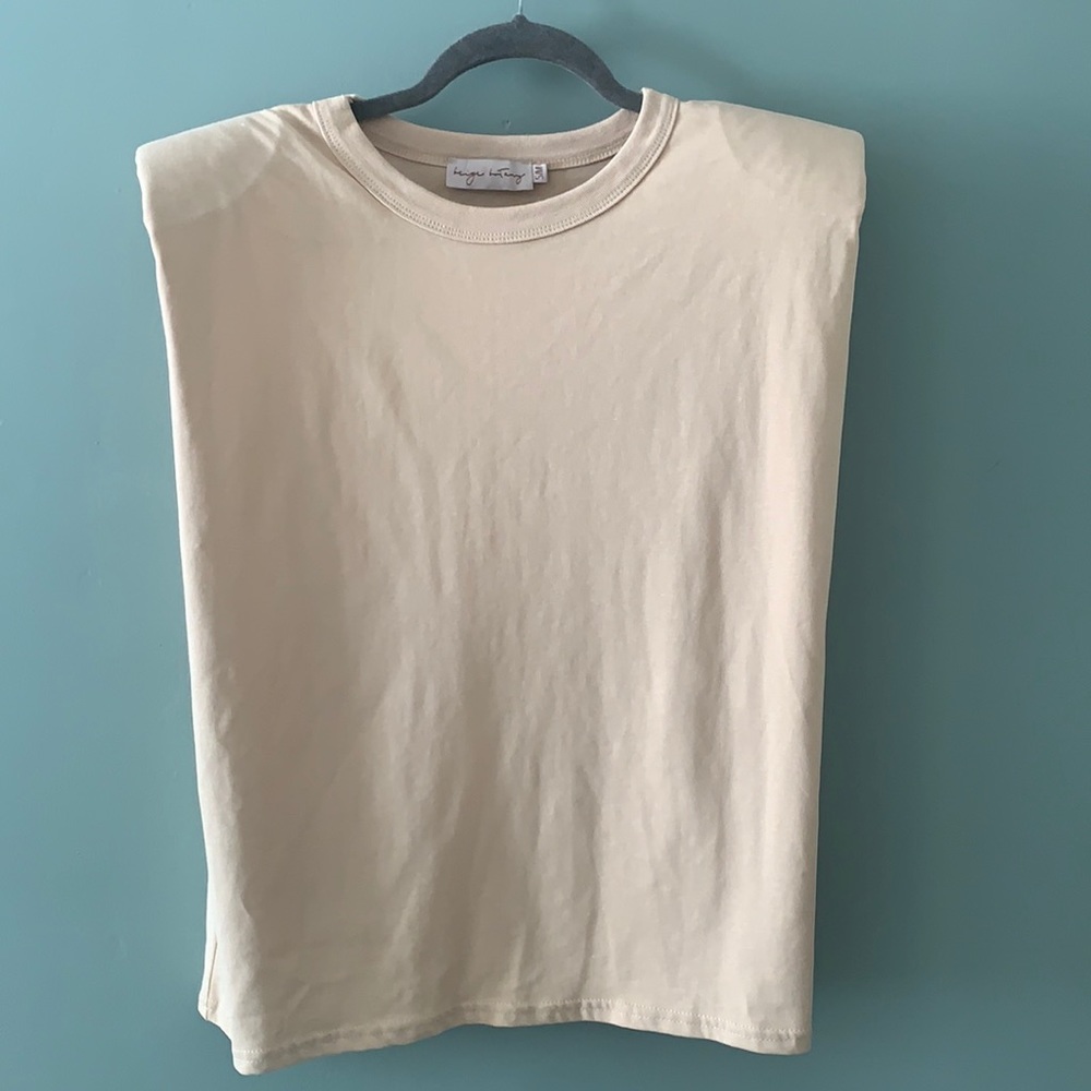 Padded cream/tan shirt. Size small.